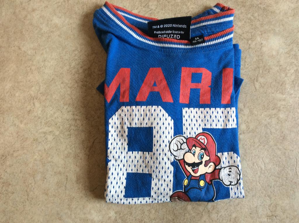 T-shirt Mario 85. Nintendo. Difuzed. blauw. maat 98/104, Kinderen en Baby's, Kinderkleding | Maat 98, Gebruikt, Difuzed, Ophalen of Verzenden