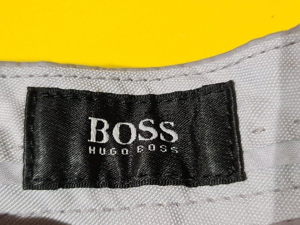 Nieuw Hugo Boss broek met stretch en grijze kleur 48, Kleding | Heren, Maat 48/50 (M), Nieuw, Ophalen of Verzenden, Hugo Boss