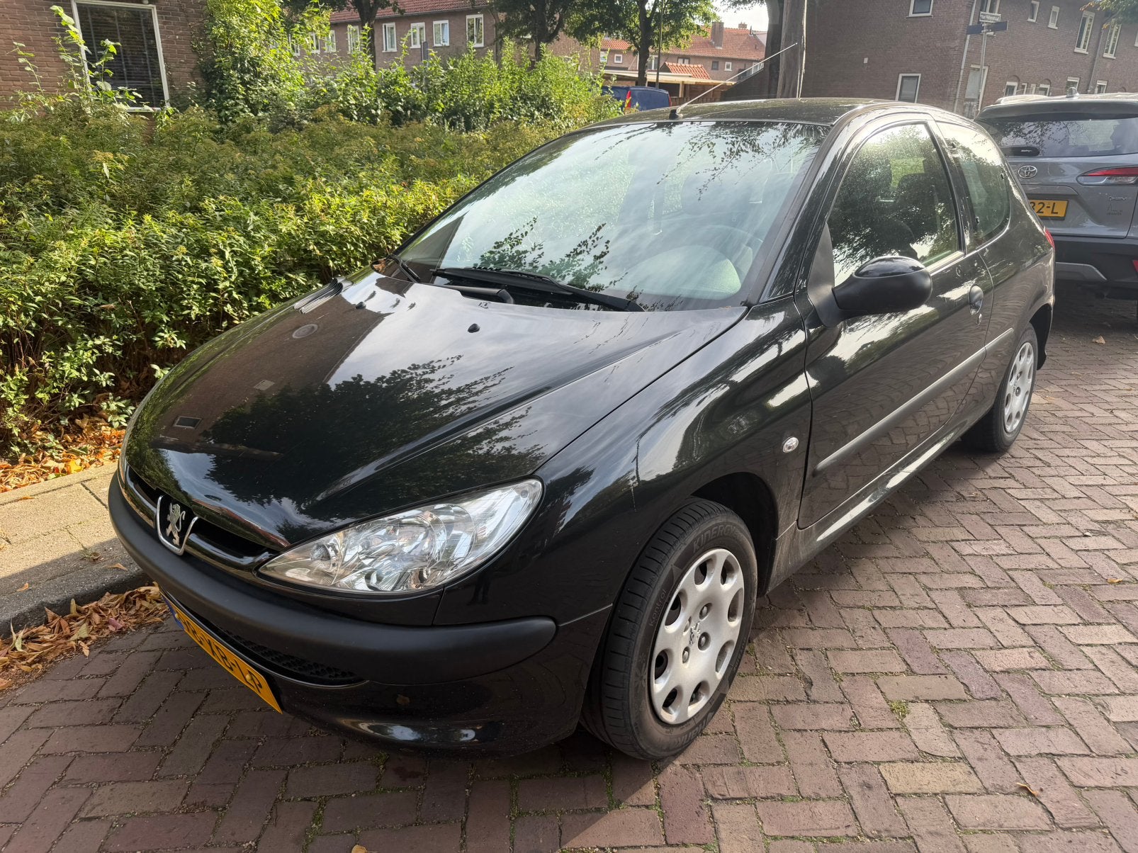 Peugeot 206 1.4 2007 | 168.000 KM | Lange APK | €1250, Auto's, Voorwielaandrijving, Stof, 4 cilinders, Zwart