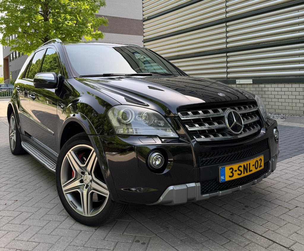 Mercedes Benz ML 63 AMG 10th Anniversary Edi. Volledig OH, Auto's, Automaat, Zwart, Leder, Vierwielaandrijving