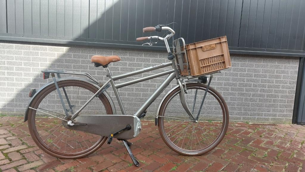 Jongensfiets met krat, Ophalen