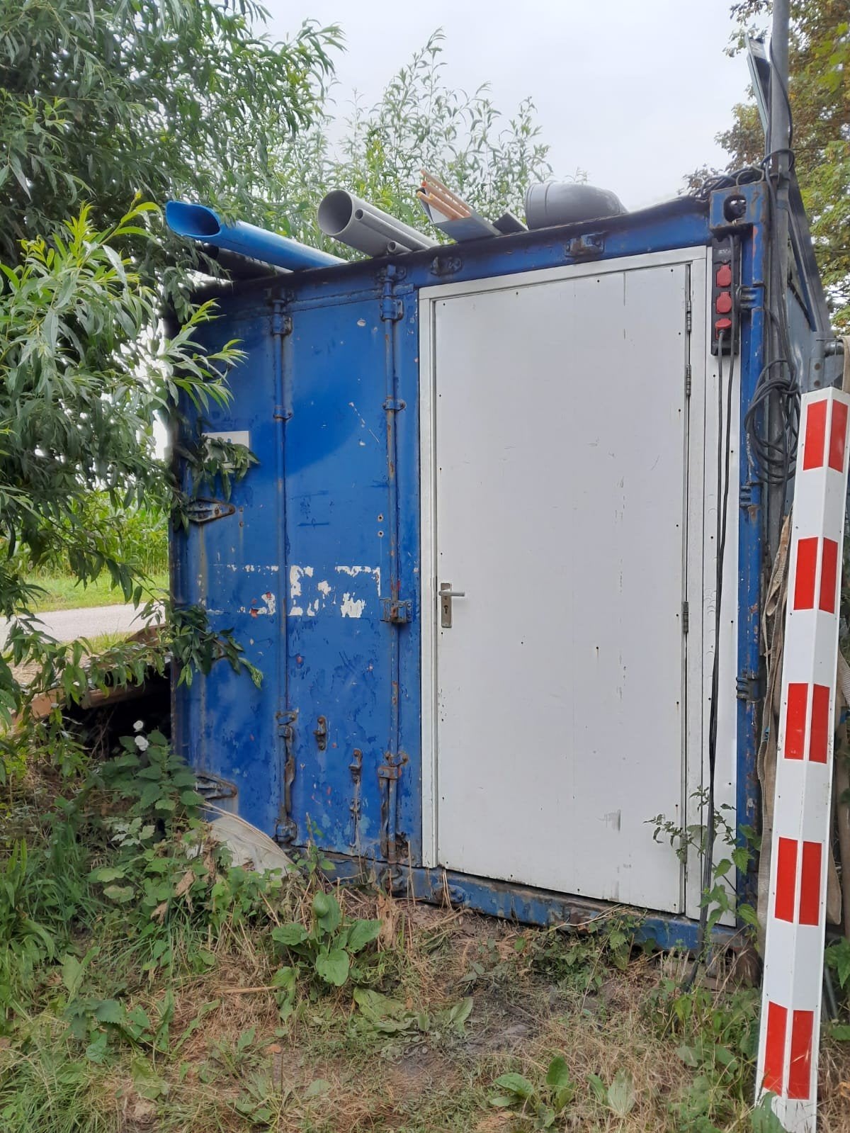 Aangeboden gebruikte opslag container, Ophalen