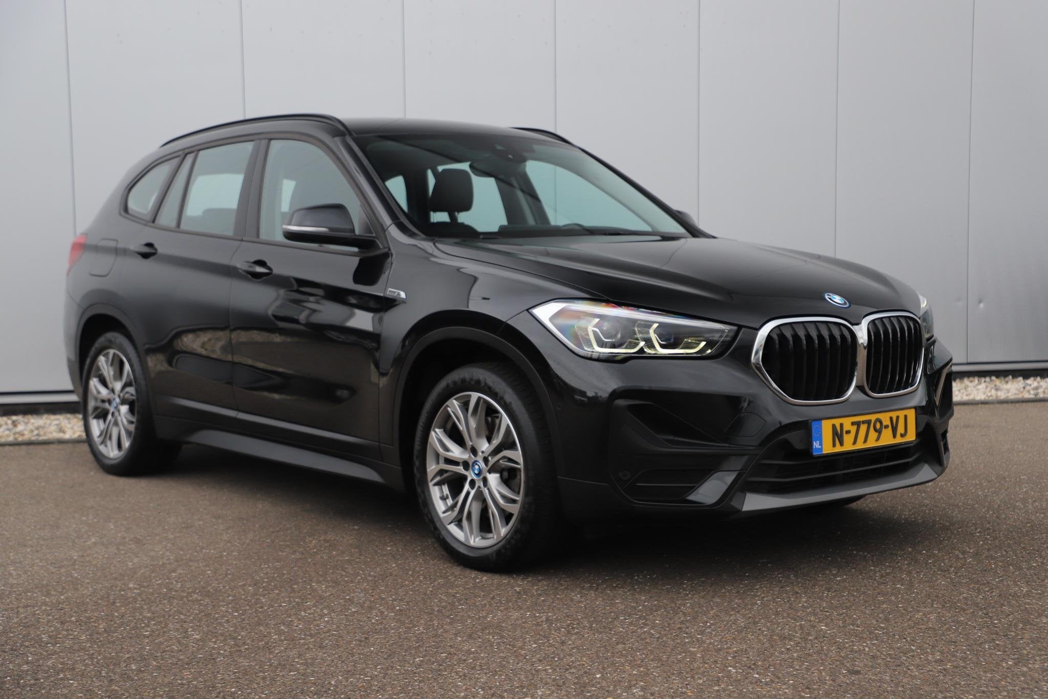 BMW X1 xDrive25e Business Edition Plus Trekhaak Leder LED Na, Auto's, Gebruikt, Met garantie (alle), Zwart, Bedrijf
