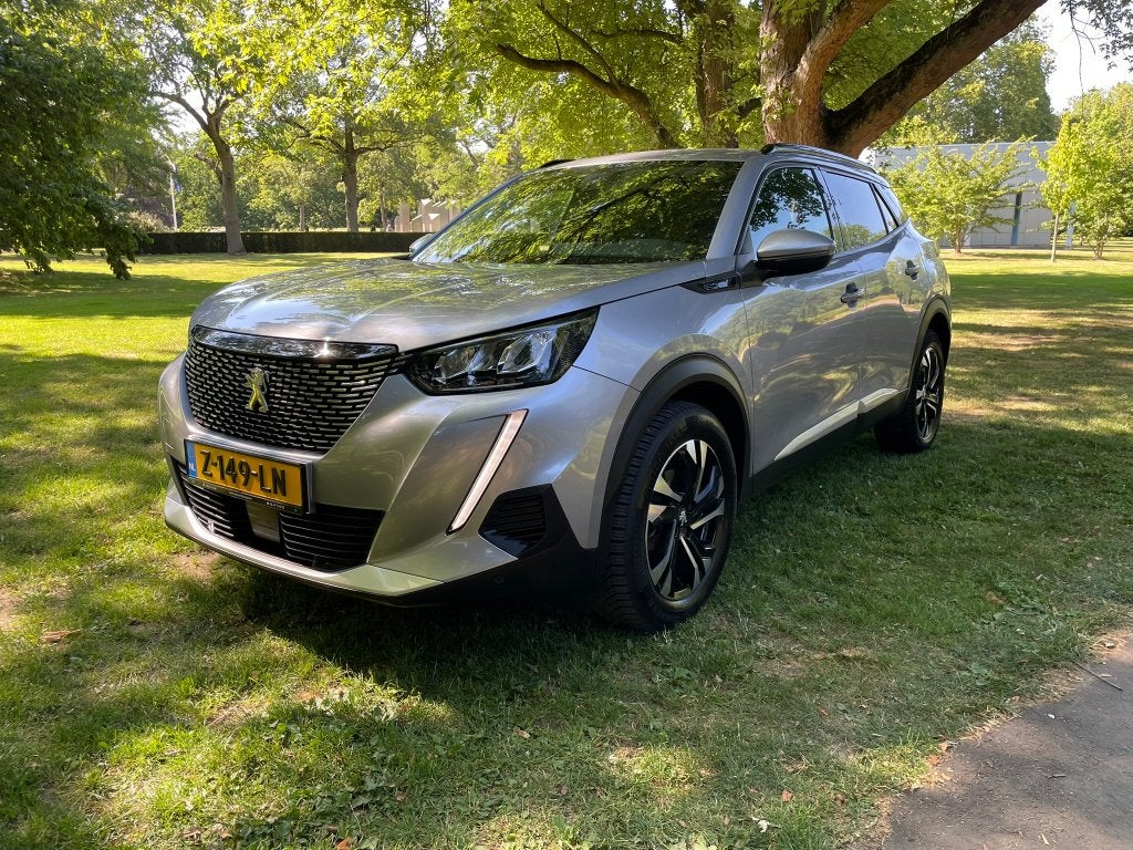 Peugeot 2008 GT-Line Automaat | Camera - CarPlay - Trekhaak, Auto's, Euro 6, 1199 cc, LED verlichting, Leder en Stof