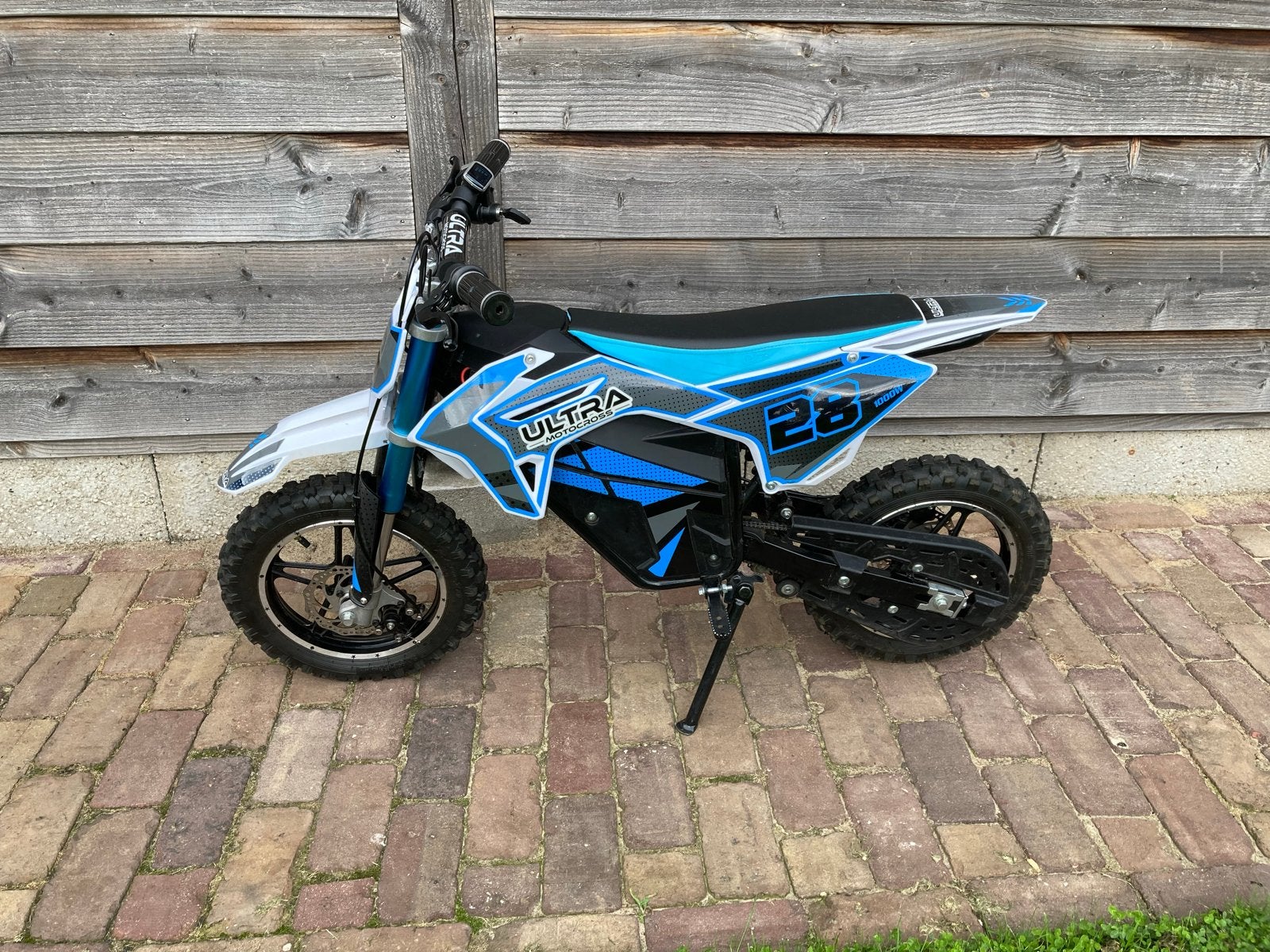 Z.g.a.n. Ultra 1000W elektrische kinder crossmotor, Ophalen, Zo goed als nieuw, Schijfrem, Dirtbike