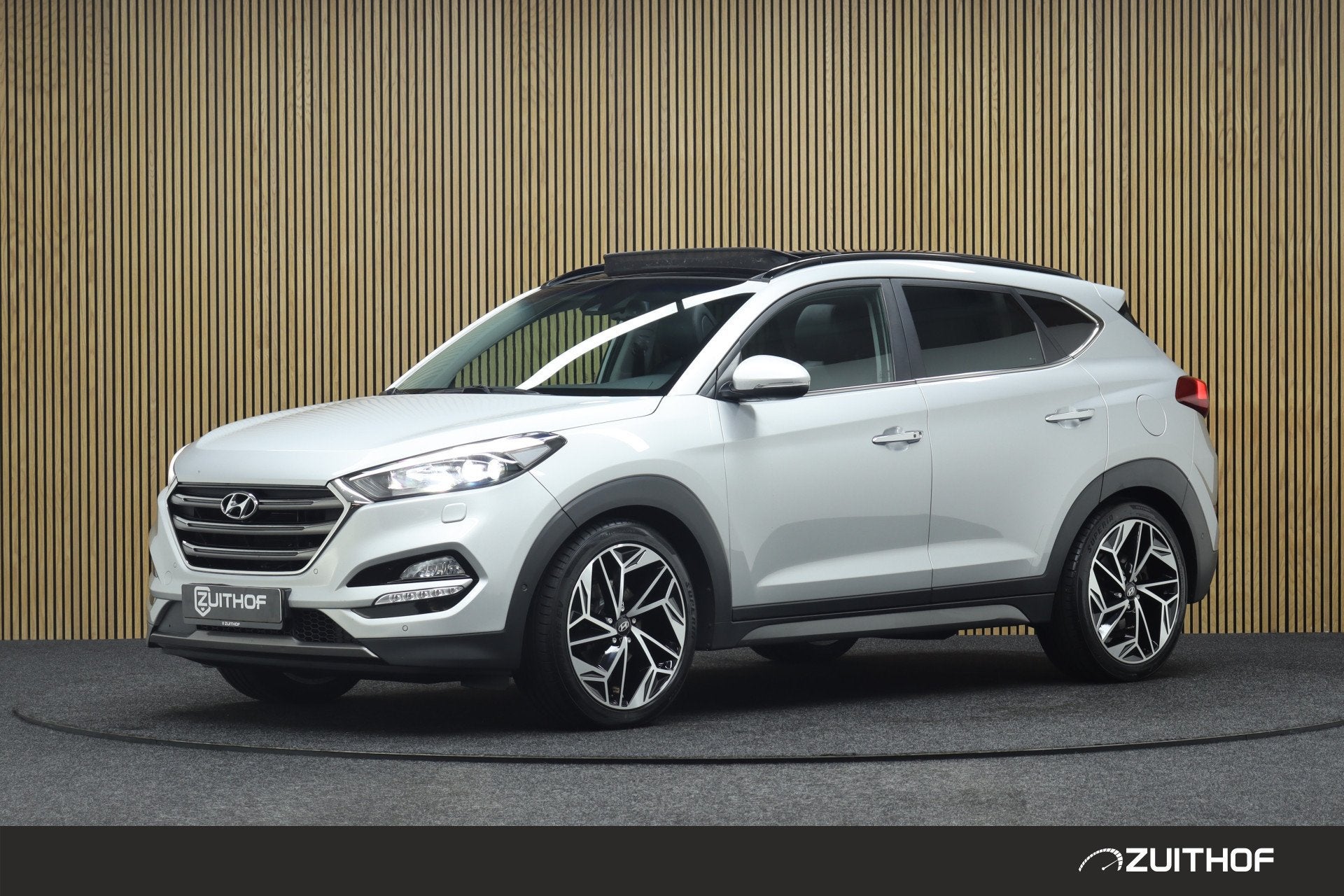 Hyundai Tucson 1.6 T-GDi Premium 4WD | Elek. Glazen Panorama, Auto's, Gebruikt, 4 cilinders, Leder, Bedrijf
