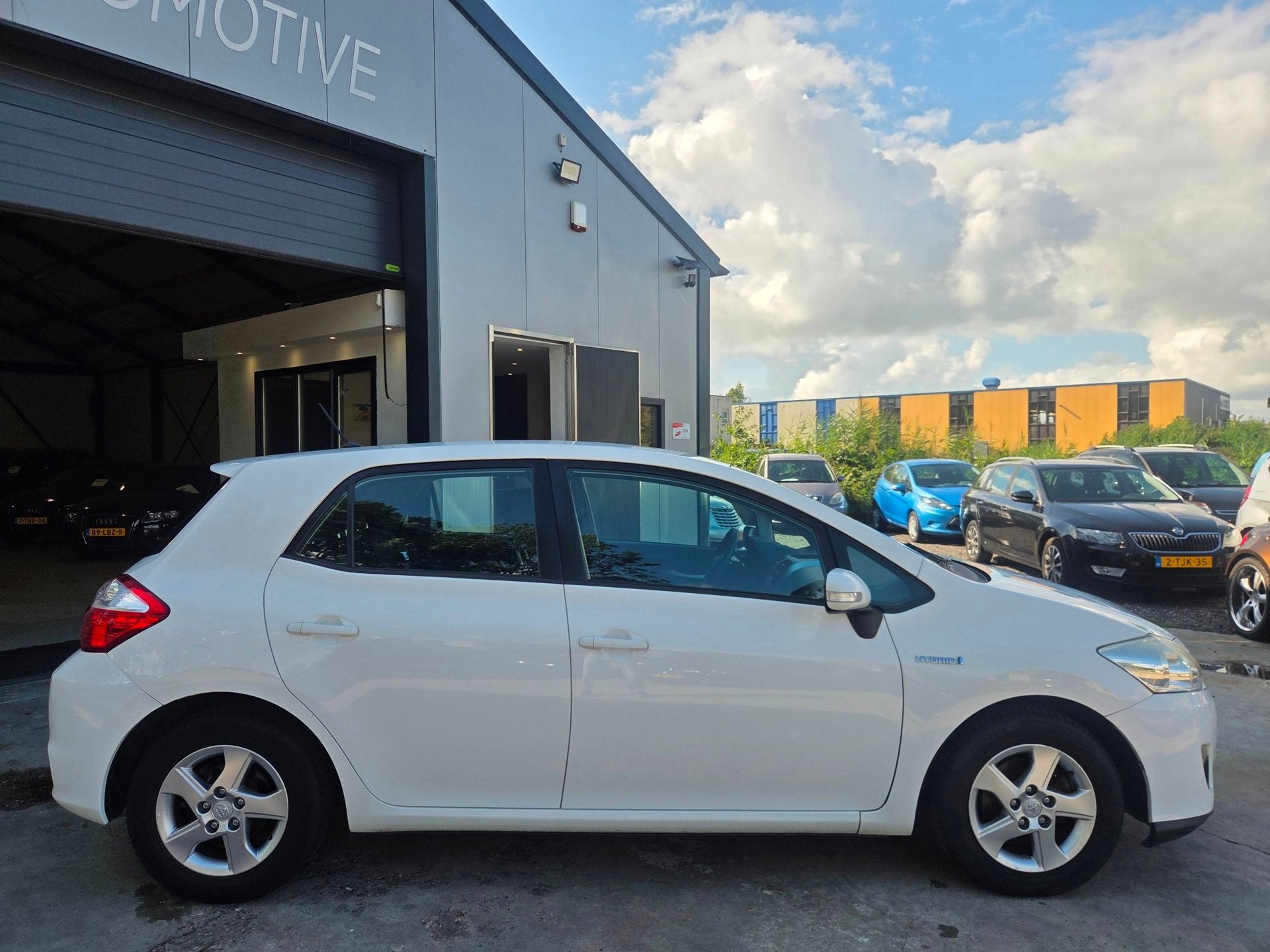 Toyota Auris 1.8 Full Hybrid Business, Auto's, Toyota, Euro 5, Stof, Gebruikt, Zwart