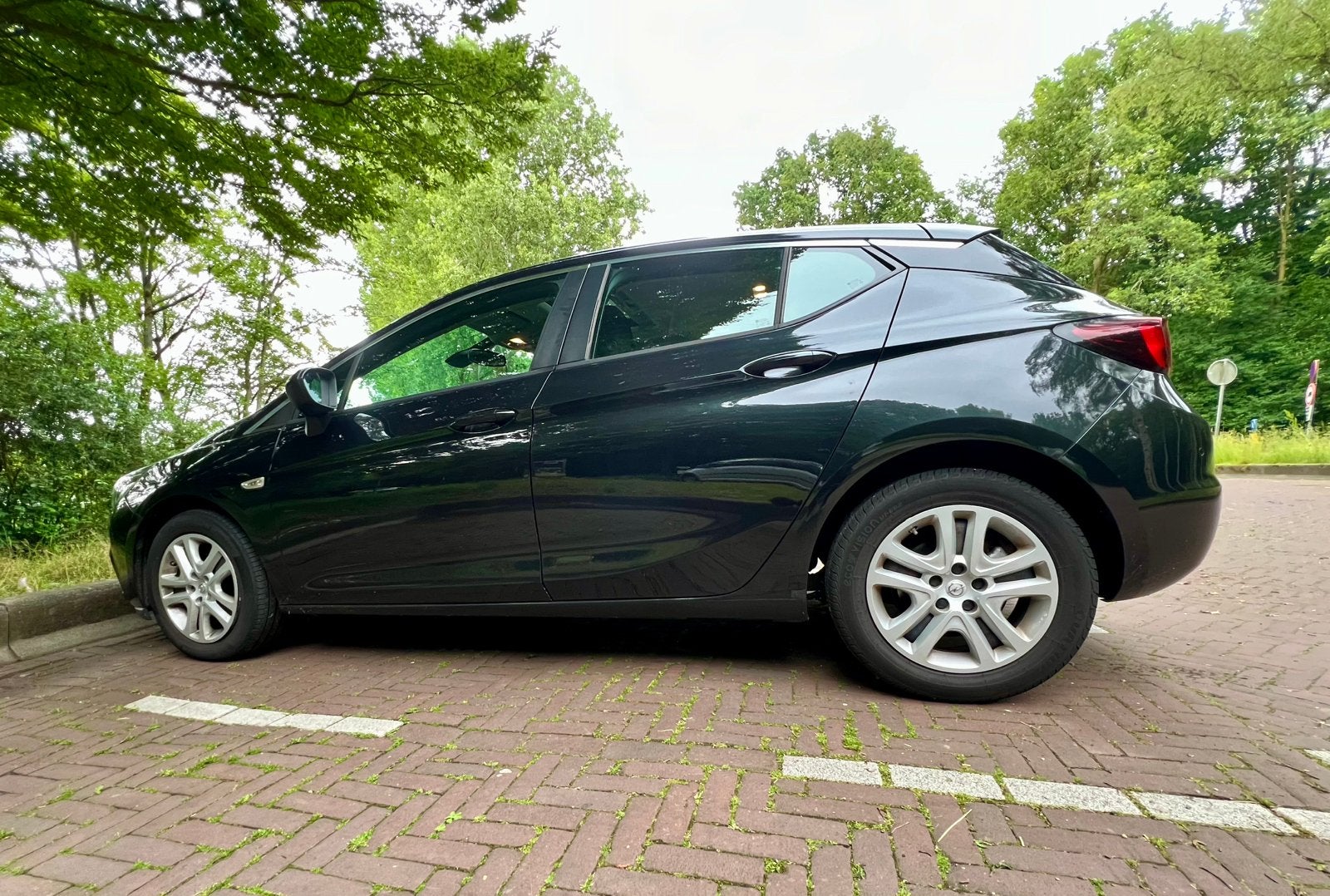 Opel Astra 1.0 Turbo 77KW 5D 2016 Zwart, Stof, Zwart, 610 kg, Origineel Nederlands