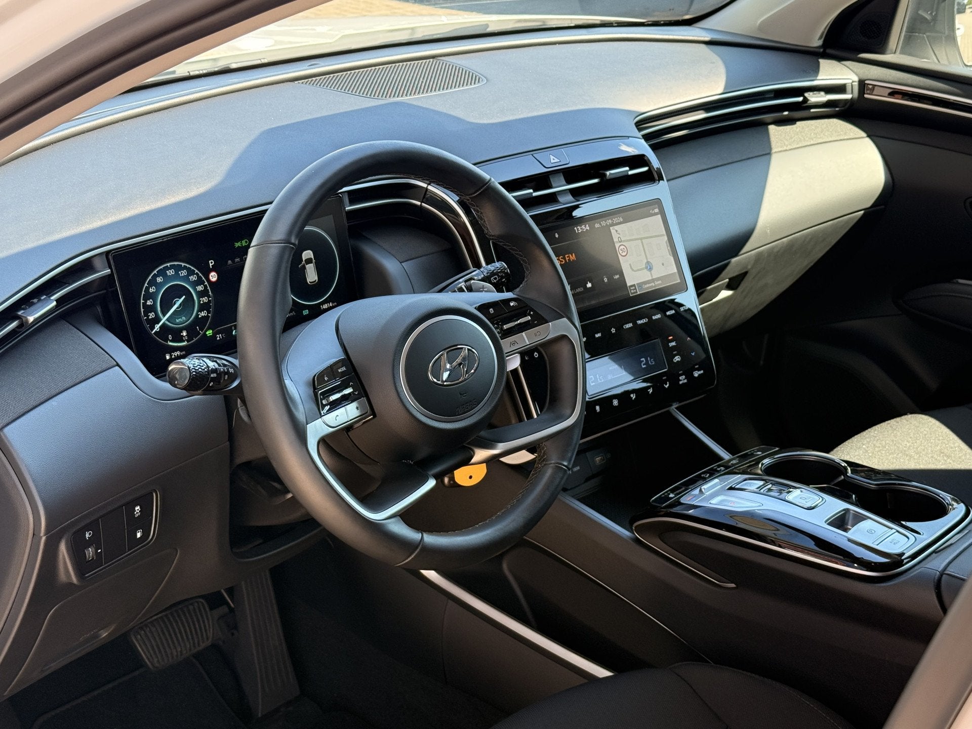 Hyundai Tucson 1.6 T-GDI PHEV (plug-in) | 19'' | NIEUWSTAAT, Auto's, Automaat, Stof, Gebruikt, 4 cilinders