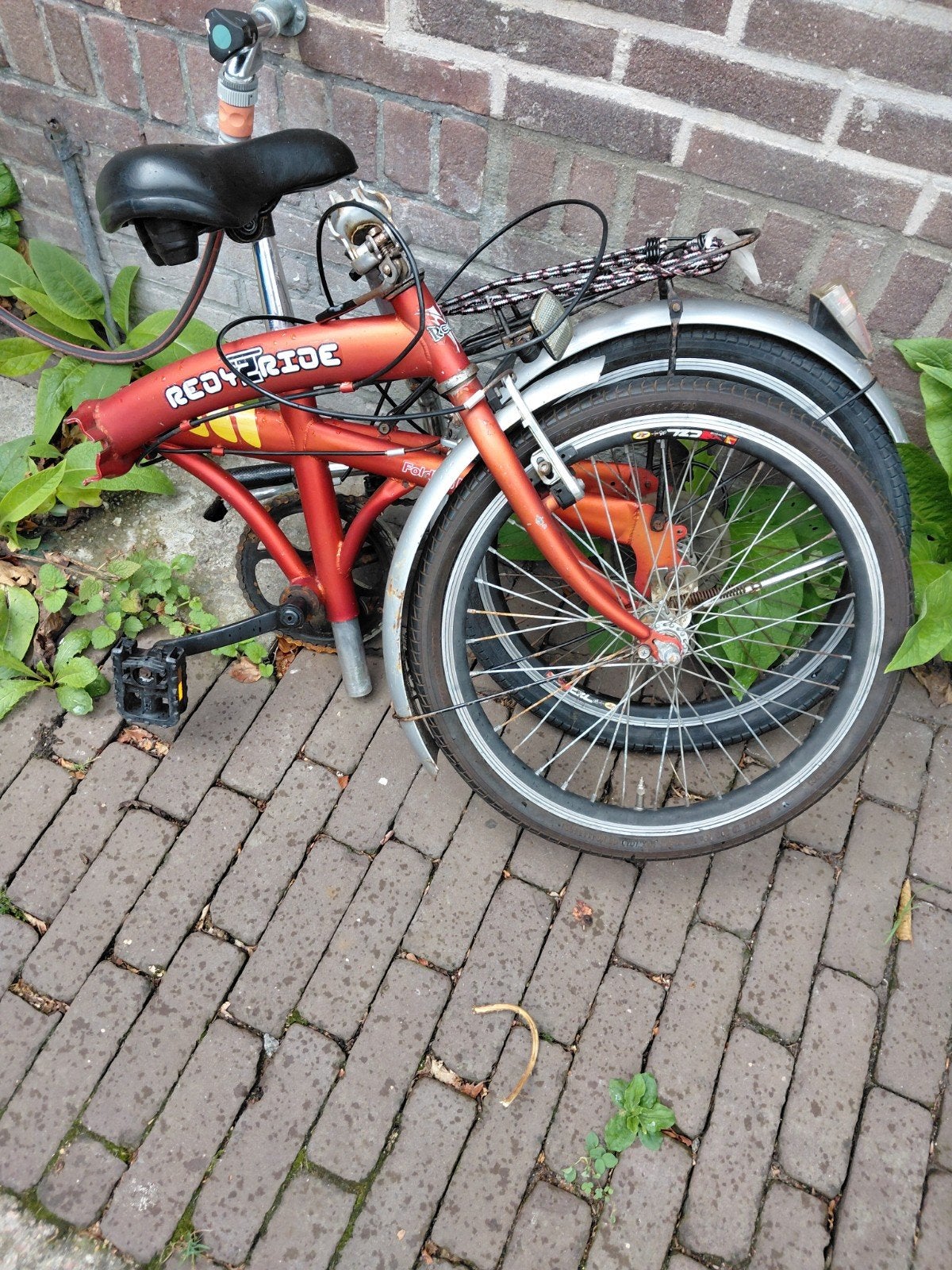 Vouwfiets - Heeft wat aandacht nodig, Ophalen
