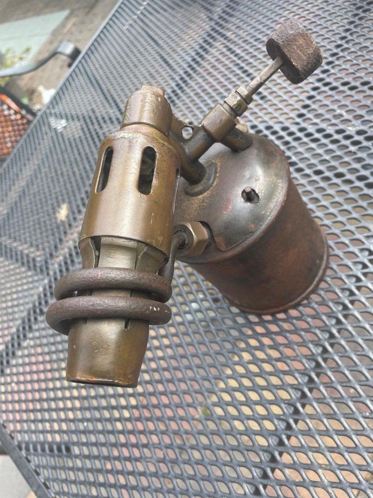 antieke benzinebrander, Ophalen