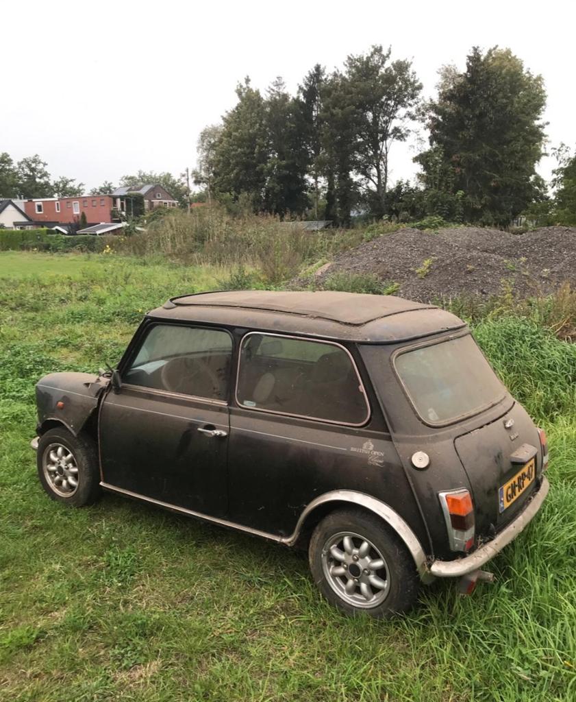 Rover Mini 1.3 I E2 1993 Zwart, Auto's, Voorwielaandrijving, 53 pk, 4 cilinders, Origineel Nederlands