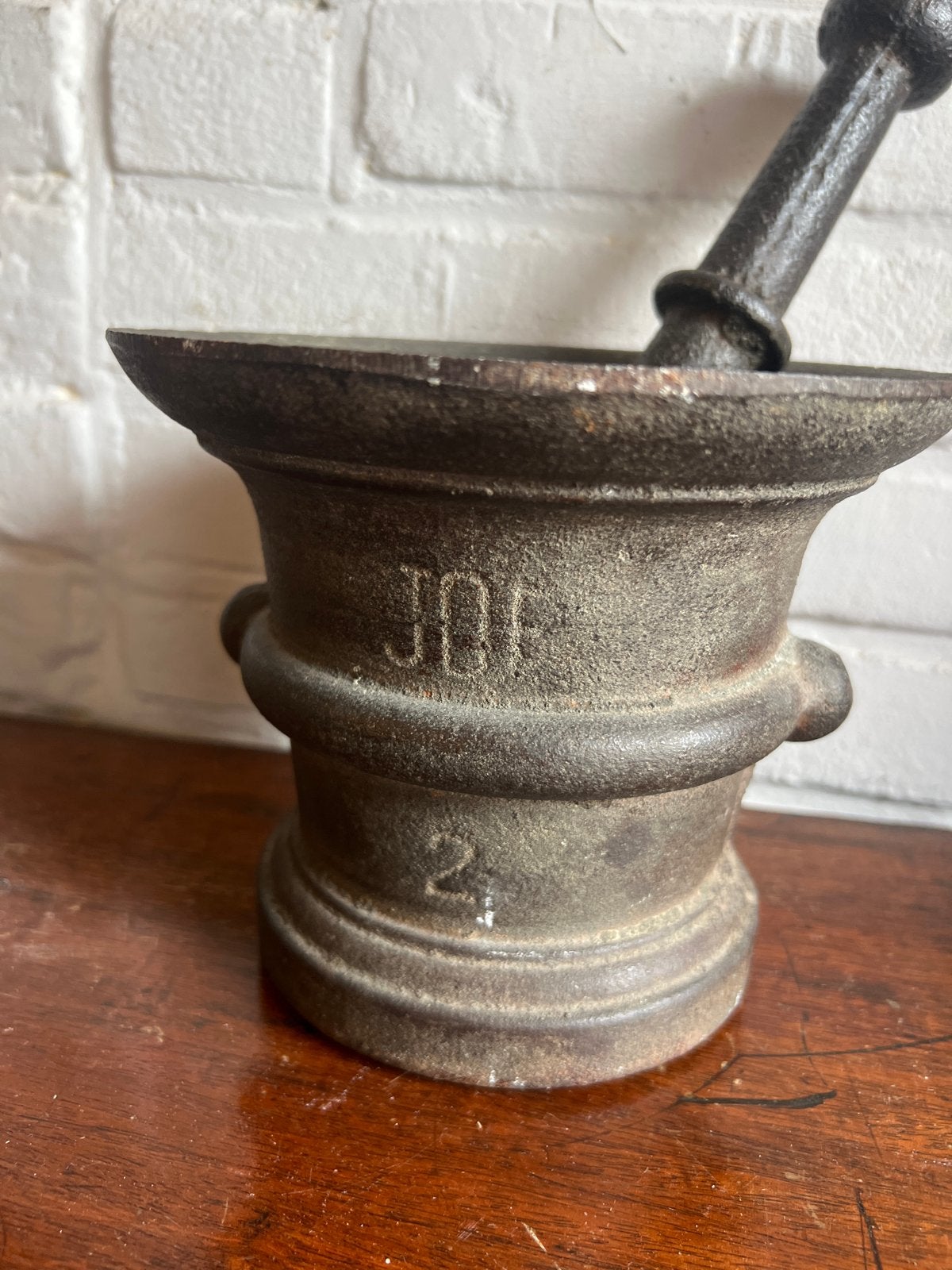 Antieke gietijzeren vijzel met stamper, Antiek en Kunst, Ophalen of Verzenden