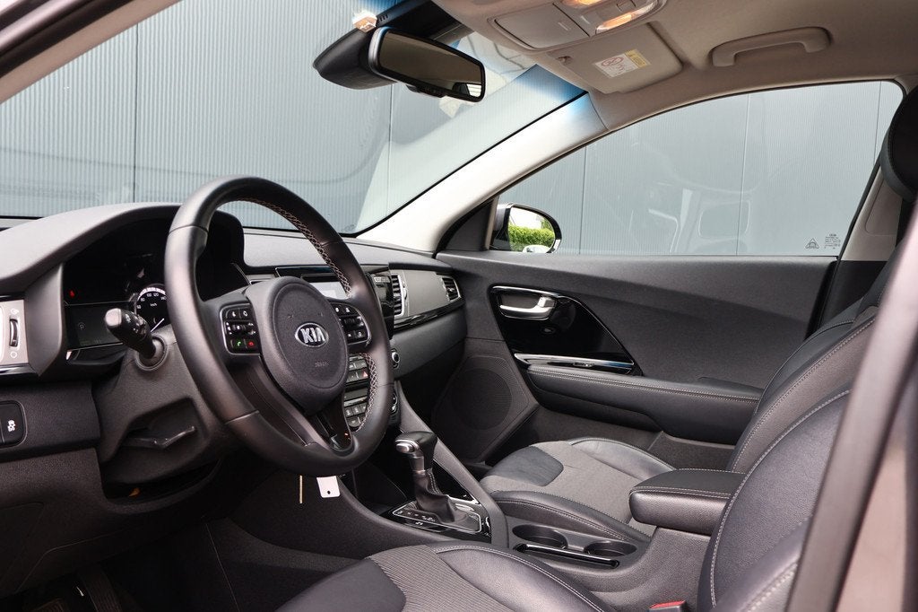 Kia Niro 1.6 GDi Hybrid First Edition Afn. Trekhaak | Apple, Auto's, Gebruikt, Met garantie (alle), Leder en Stof, Origineel Nederlands