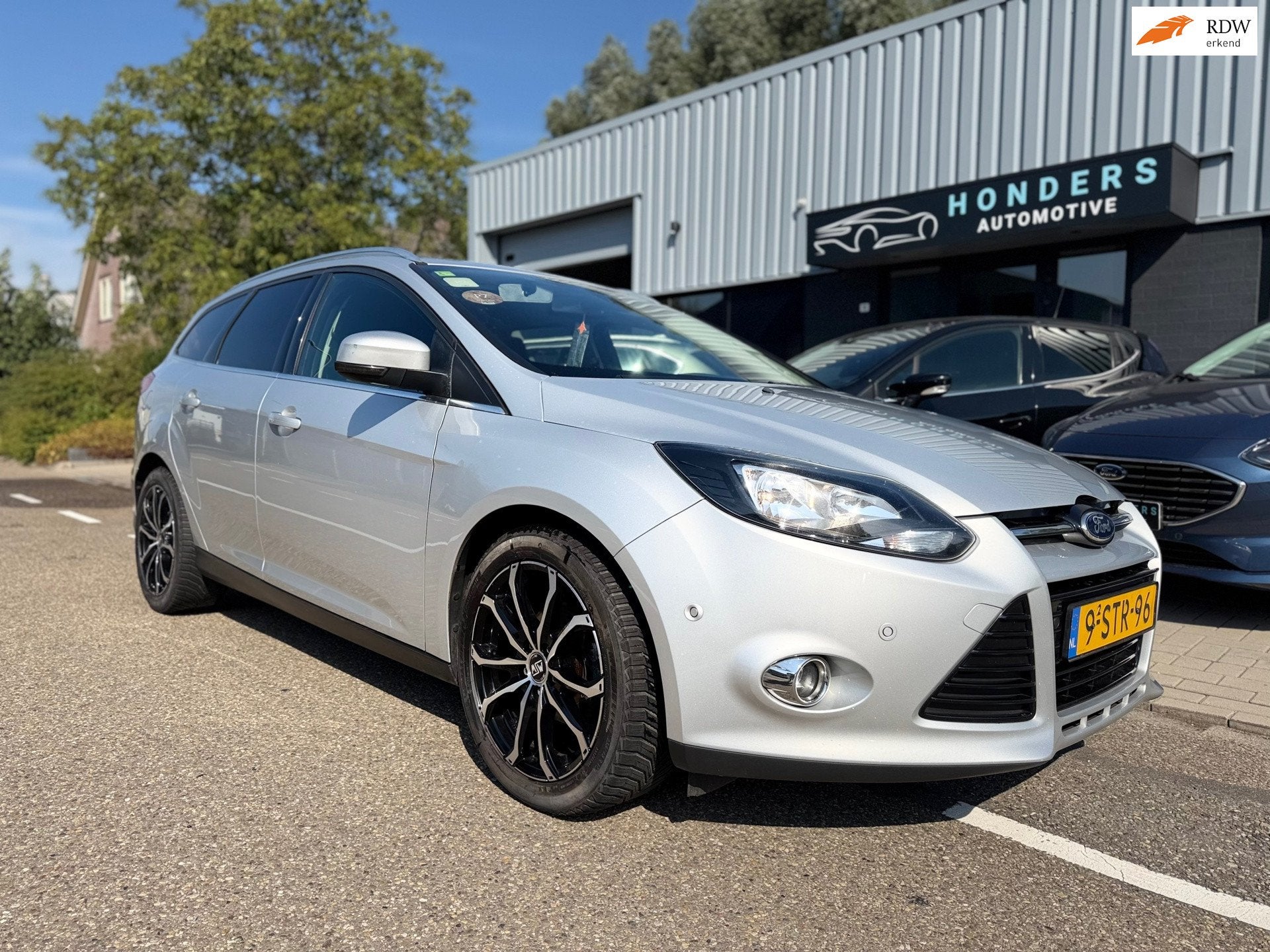 Ford Focus Wagon 1.6 TDCI ECOnetic Lease Titanium | TREKHAAK, Auto's, Euro 5, Stof, Gebruikt, Zwart