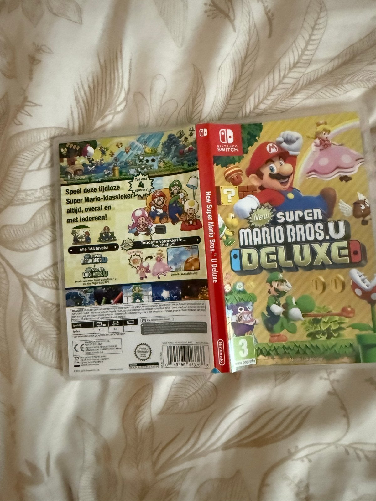 New Super Mario Bros. U Deluxe - Nintendo Switch, Spelcomputers en Games, Eén computer, Ophalen of Verzenden, Zo goed als nieuw