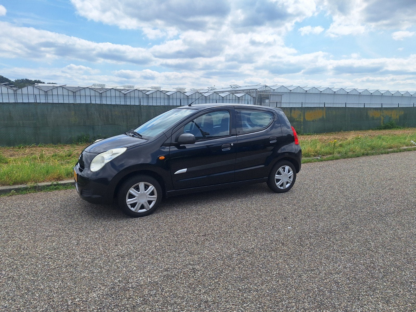 Suzuki Alto 1.0 2010 Zwart met Airco, Auto's, Voorwielaandrijving, 200 kg, 4 stoelen, Origineel Nederlands
