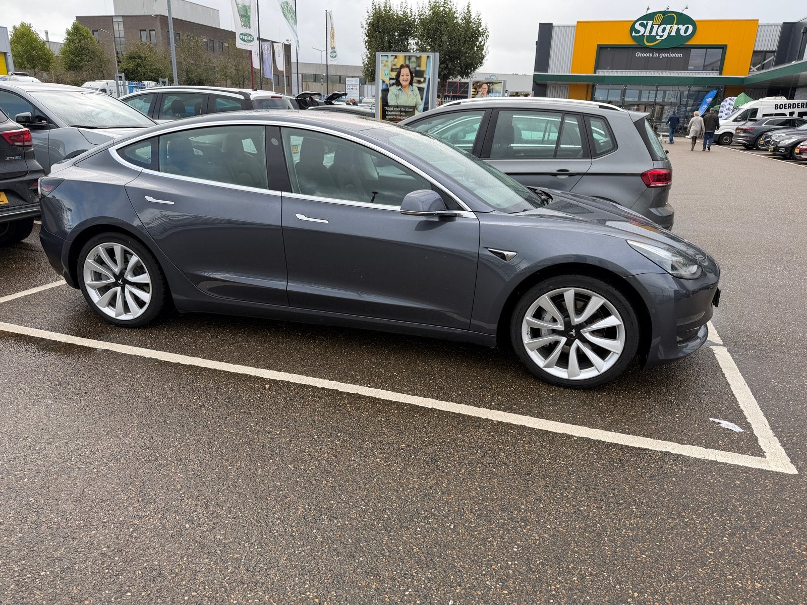 Tesla Model 3 2019 long range 130.000km, Auto's, Automaat, Zwart, Origineel Nederlands, Elektrisch