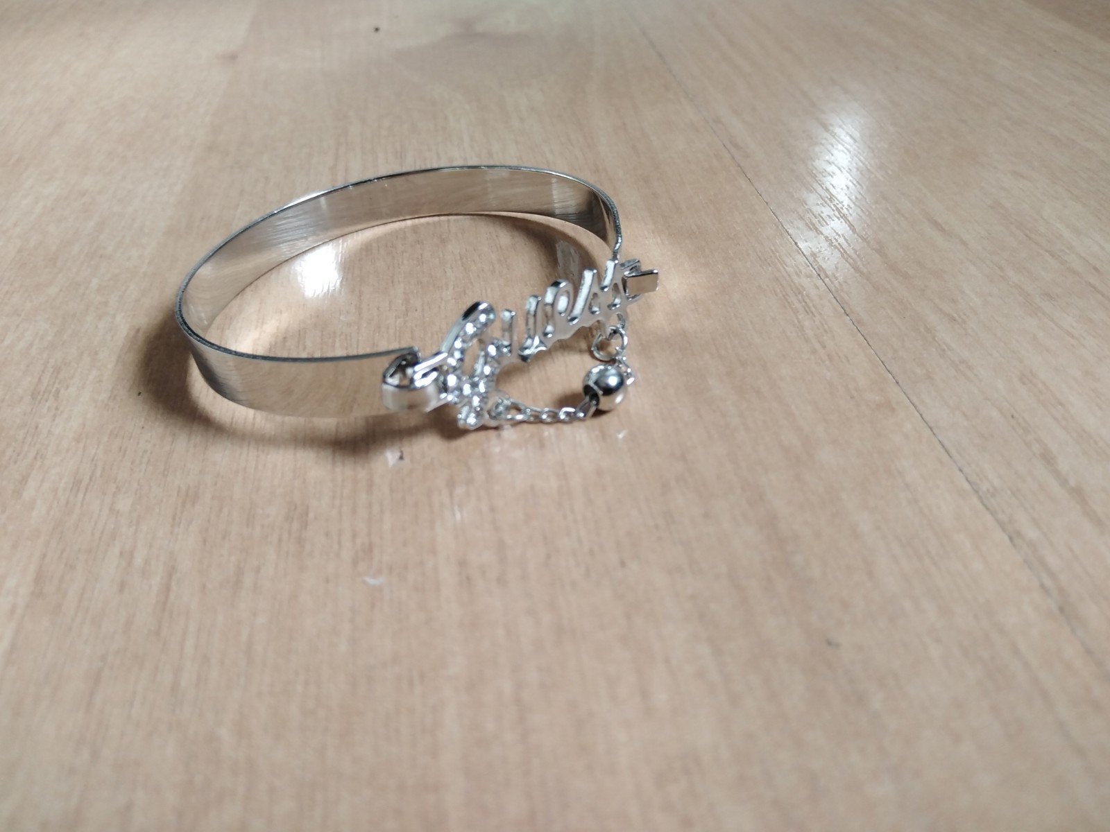 Zilverkleurige armband guess, Overige materialen, Nieuw, Ophalen of Verzenden, Zilver