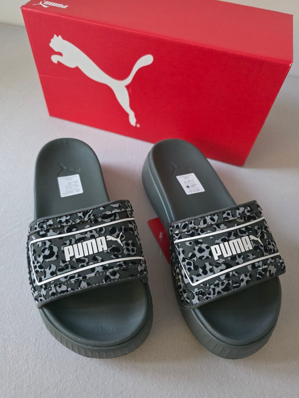 Puma Platform Slides Luipaardprint Grijs Maat 37 Nieuw, Slippers, Service@puma.com, Puma SE, Puma Way 1, 91074 Herzogenaurach, Germany