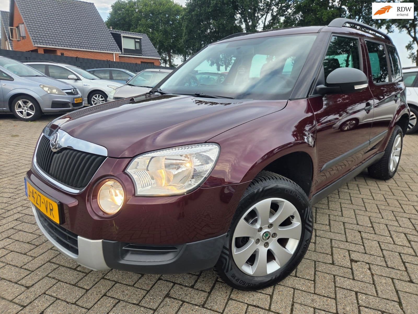Skoda Yeti 1.2 TSI Comfort 2011 Automaat/Airco/Cruise/Trekha, Auto's, Skoda, Euro 5, Gebruikt, Zwart, 4 cilinders