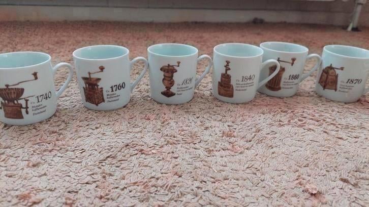 6x koffiekopjes + schotels met koffiemolen afbeelding, Ophalen of Verzenden, Gebruikt, Overige stijlen, Kop(pen) en/of Schotel(s)