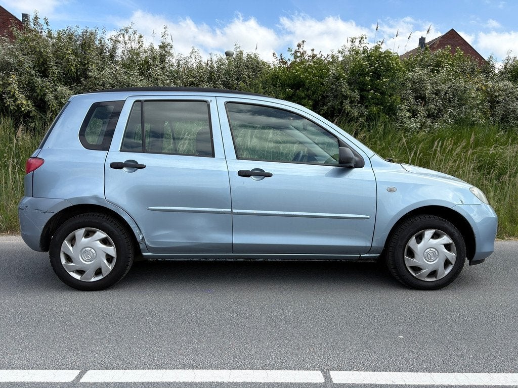Mazda 2 Mazda 2 1.4 Exclusive | Automaat | 2003 | 114.480KM, Zwart, 4 cilinders, Blauw, Origineel Nederlands
