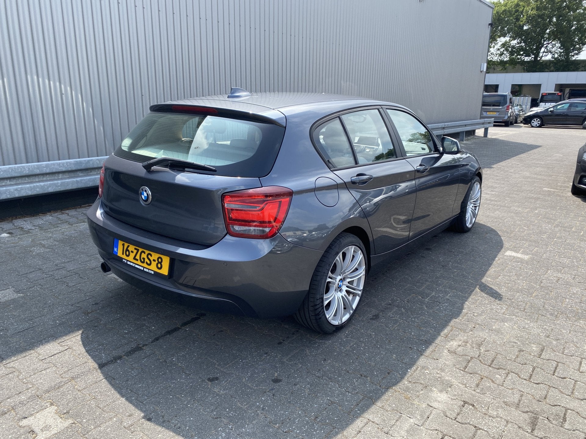 BMW 1-serie 116i Upgrade Edition Leer, Clima, Navi, CC, PDC,, Auto's, BMW, 1-Serie, Euro 5, Gebruikt, Beige