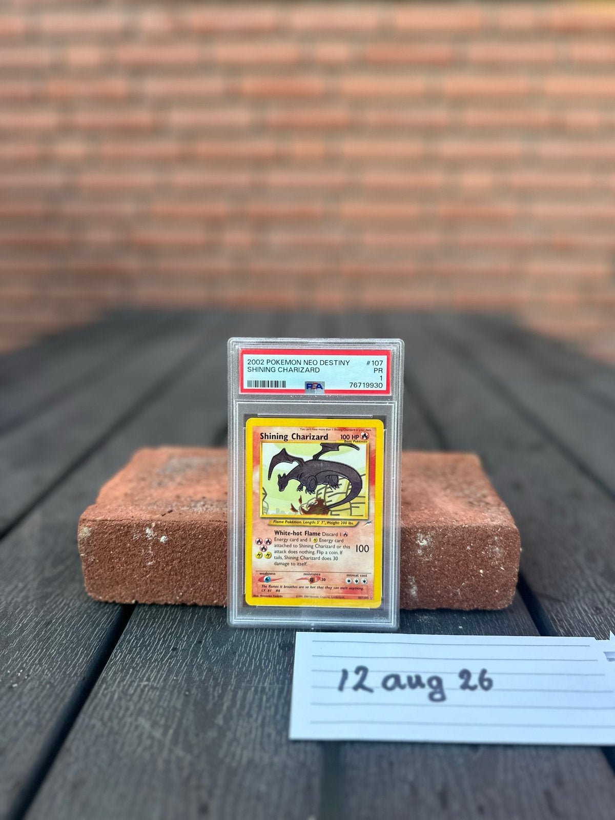 Pokémon Shining Charizard Neo Destiny PSA 1, Ophalen of Verzenden, Zo goed als nieuw, Losse kaart
