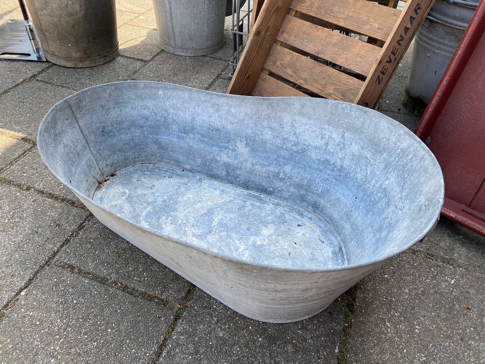 Zinken kinderbadje, Ophalen