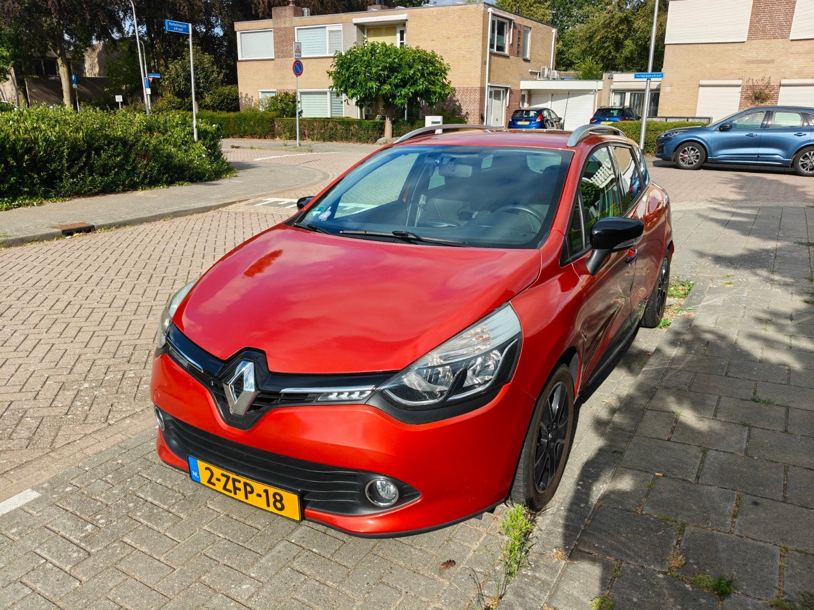 Renault Clio Energy TCe 90pk S&S 2015 Rood, Auto's, Renault, Voorwielaandrijving, 898 cc, Origineel Nederlands, Handgeschakeld