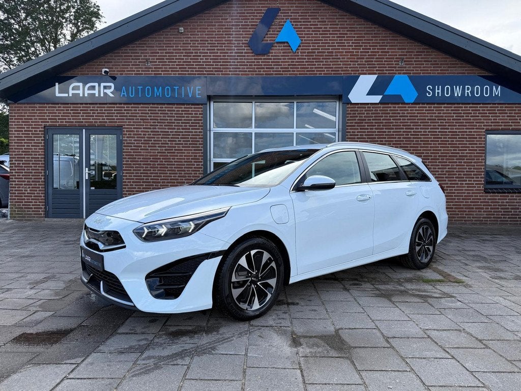 Kia Ceed Sportswagon 1.6 GDI PHEV DynamicLine 1ste Eigenaar, Auto's, Gebruikt, Zwart, Wit, 1508 kg