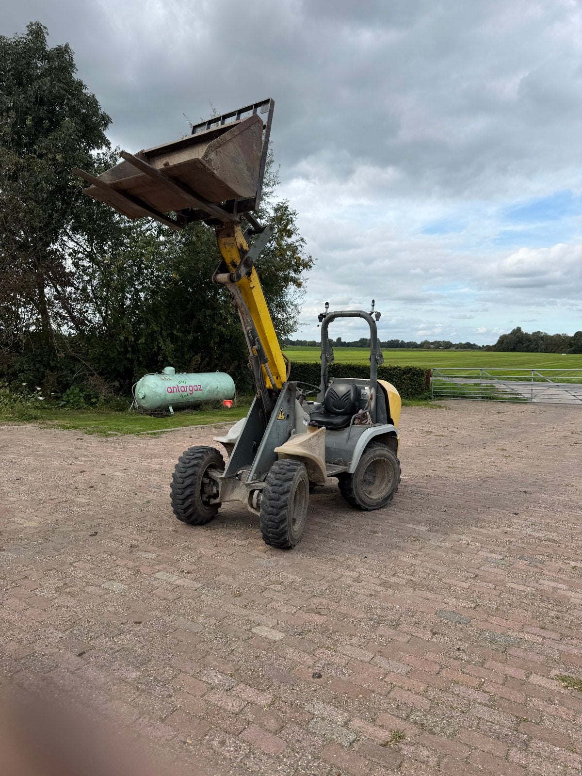 Kramer Bobcat Minishovel met diverse aanbouwdelen, Ophalen