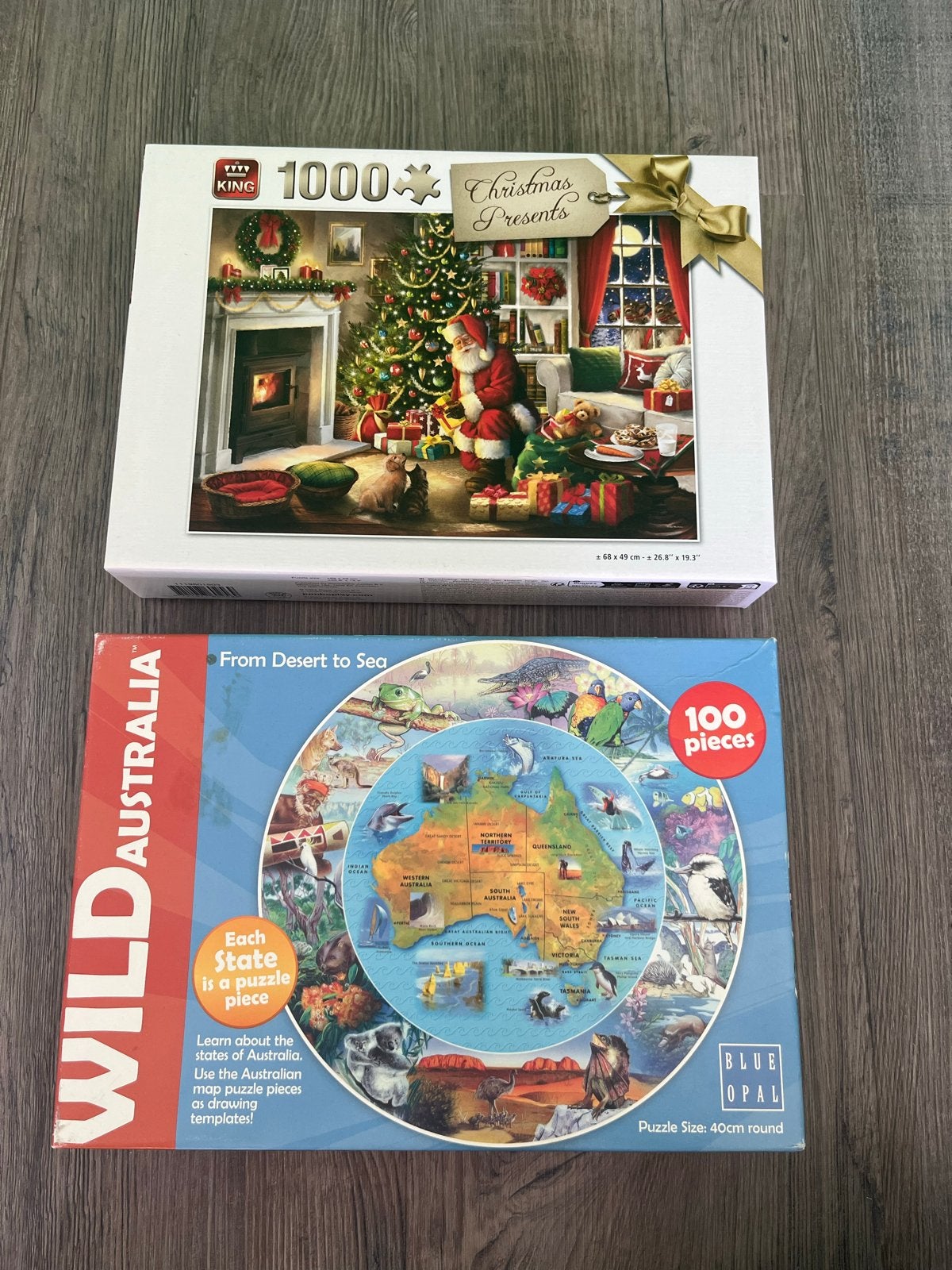 2 Legpuzzels: Kerst en Wild Australië (1000 en 100 stukjes), Ophalen of Verzenden, 500 t/m 1500 stukjes, Zo goed als nieuw, Legpuzzel