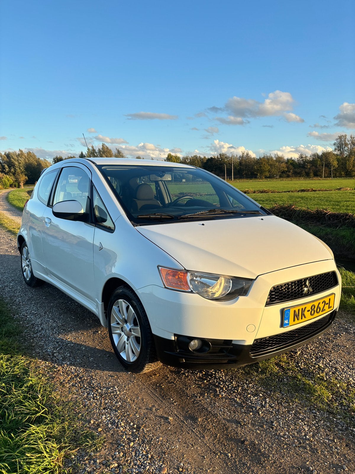 Mitsubishi Colt 1.1 Mivec CZ3 2012 Wit, Auto's, Voorwielaandrijving, Stof, 74 pk, Bedrijf