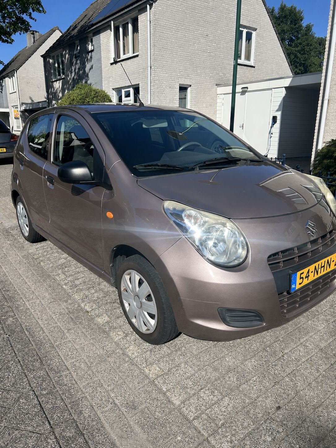 Suzuki Alto 1.0 2010 Bruin met  werkende airco!