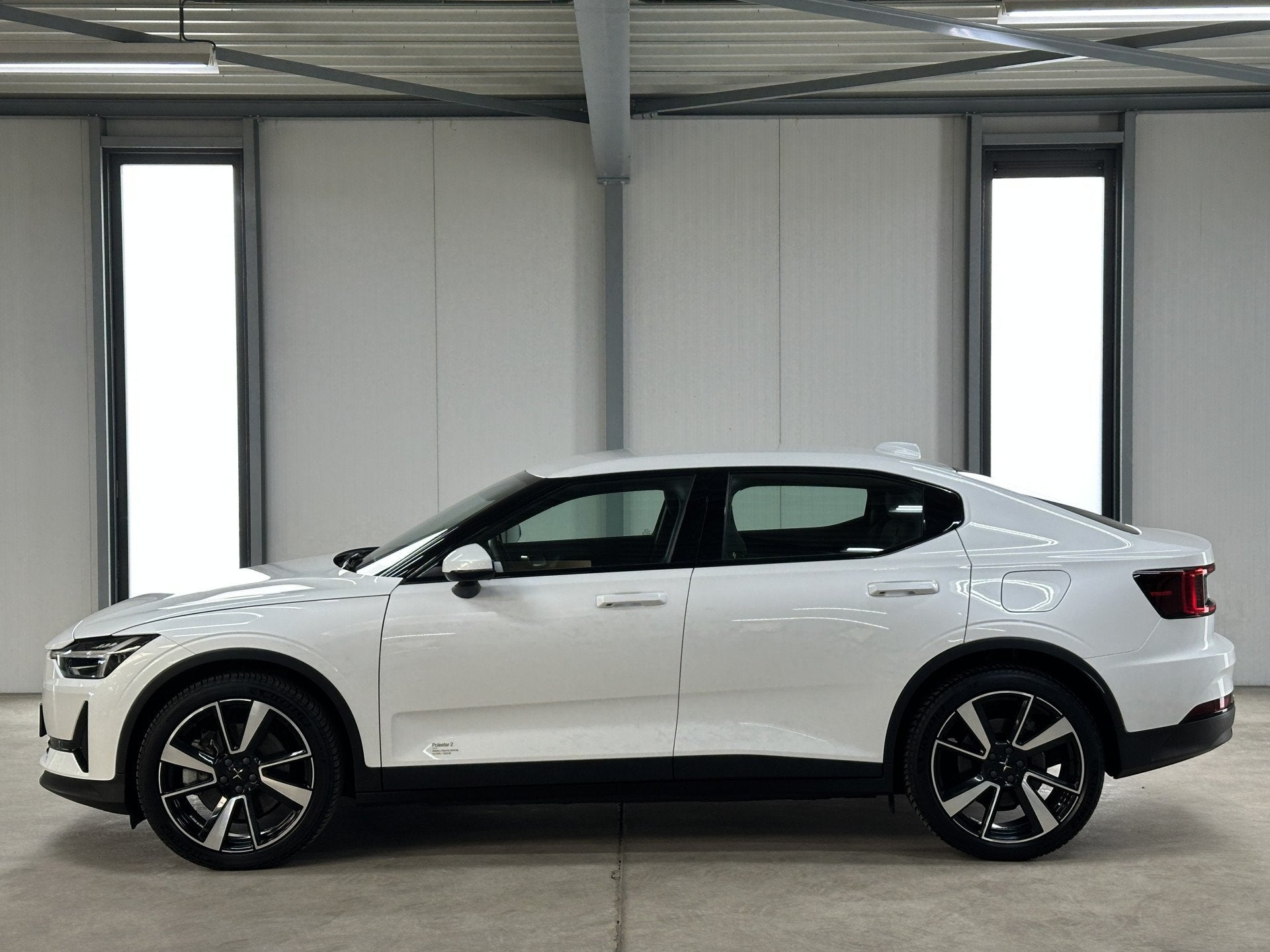 Polestar 2 Standard Range Single Motor 63kWh (bj 2023), Auto's, Polestar, Stof, Gebruikt, Zwart, Met garantie (alle)