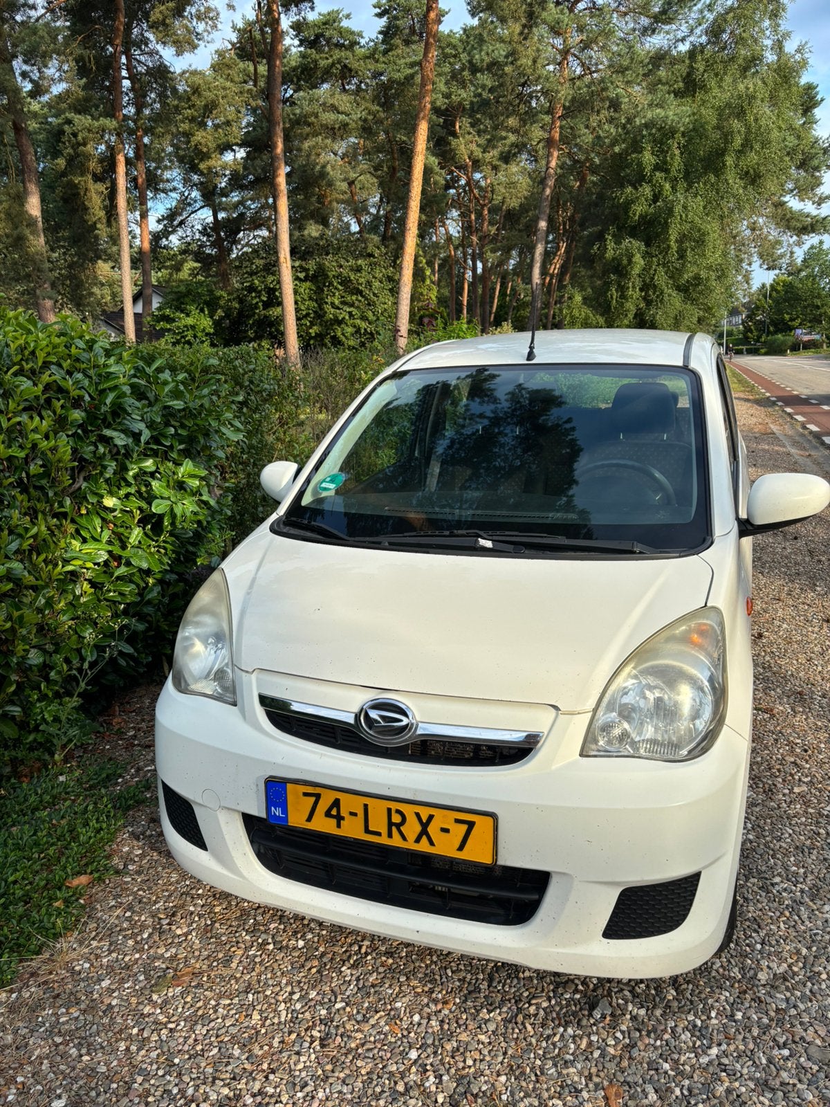 Daihatsu Cuore 1.0 5D 2010 Wit, Auto's, Daihatsu, Voorwielaandrijving, 600 kg, Zwart, 18 €/maand