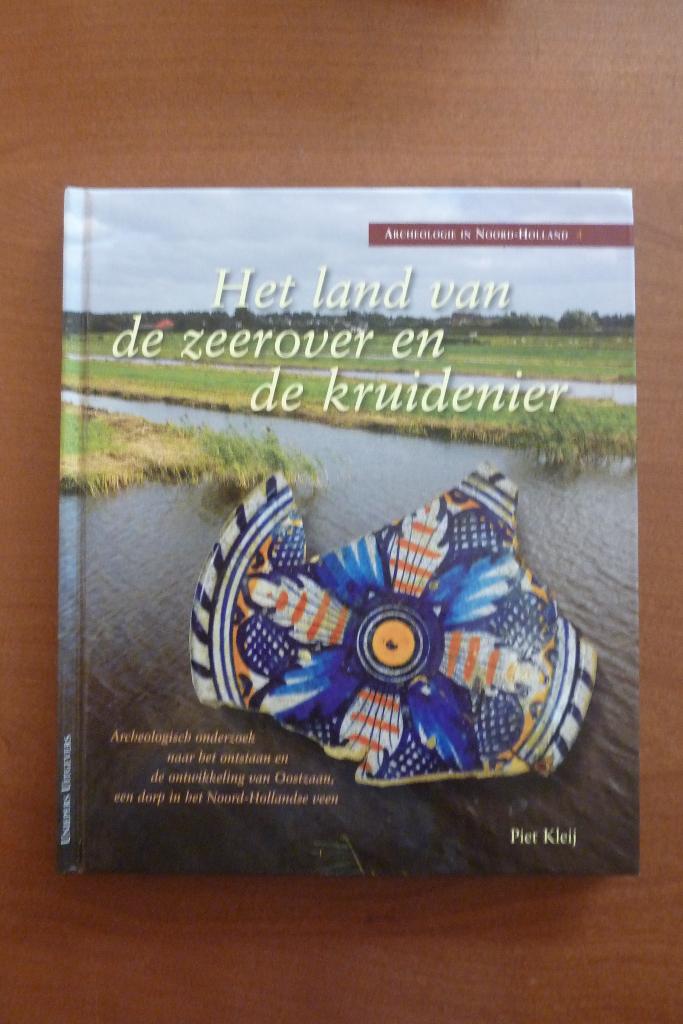 Het land van de zeerover en de kruidenier - Piet Kleij, Ophalen of Verzenden, Gelezen