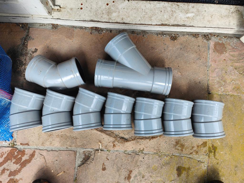 Diverse PVC 110mm manchet en lijm hulpstukken, Ophalen, Bochten, Pvc, Nieuw