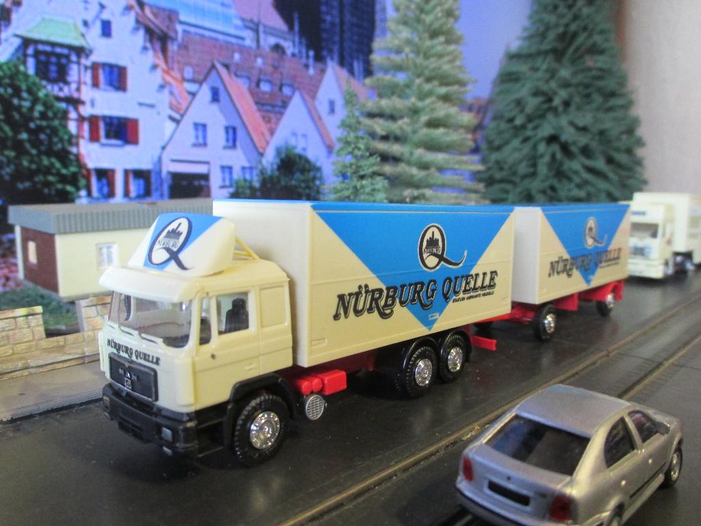MAN F90 combinatie zijlader Herpa Nürnburg Quelle Nu € 6,75, Ophalen of Verzenden, Gebruikt, Bus of Vrachtwagen, Herpa