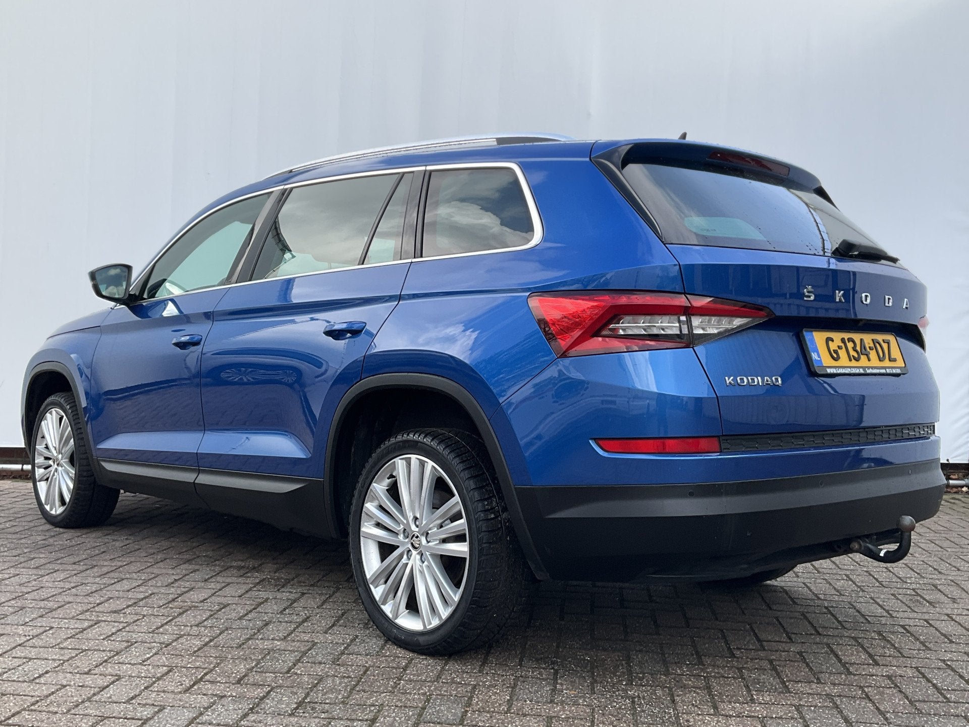 Skoda Kodiaq 1.5 TSI Edition Automaat Pano Trekhaak Canton-S, Auto's, Euro 6, 4 cilinders, 150 pk, Blauw