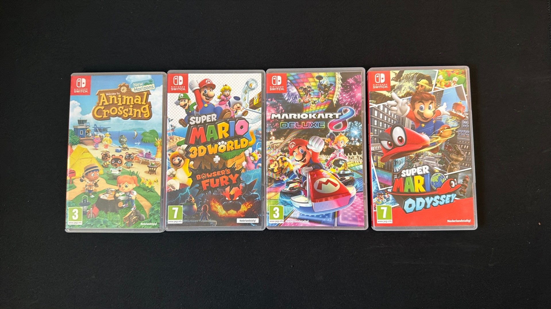 Foto 3 van Nintendo switch OLED wit - zeer compleet en net - 4 games