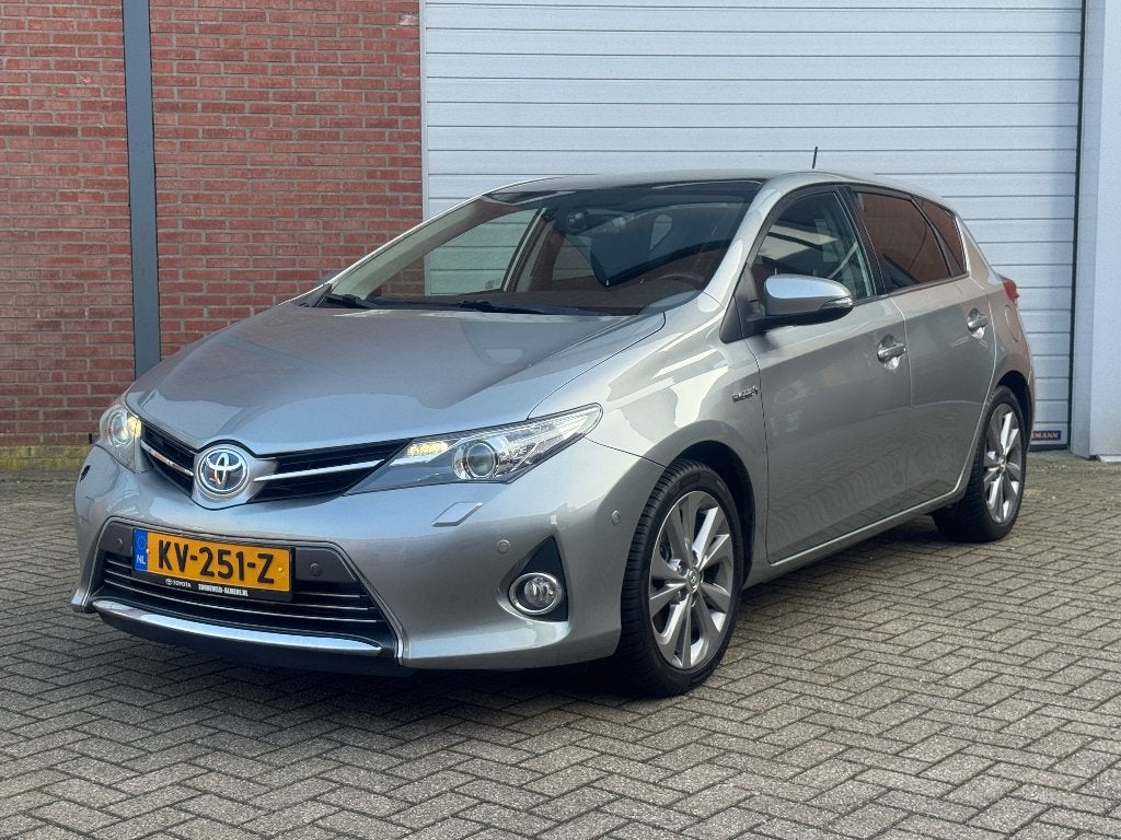 Toyota Auris 1.8 Hybrid pano JBL 5D 2014, Auto's, Toyota, Euro 5, 136 pk, Zwart, Leder en Stof