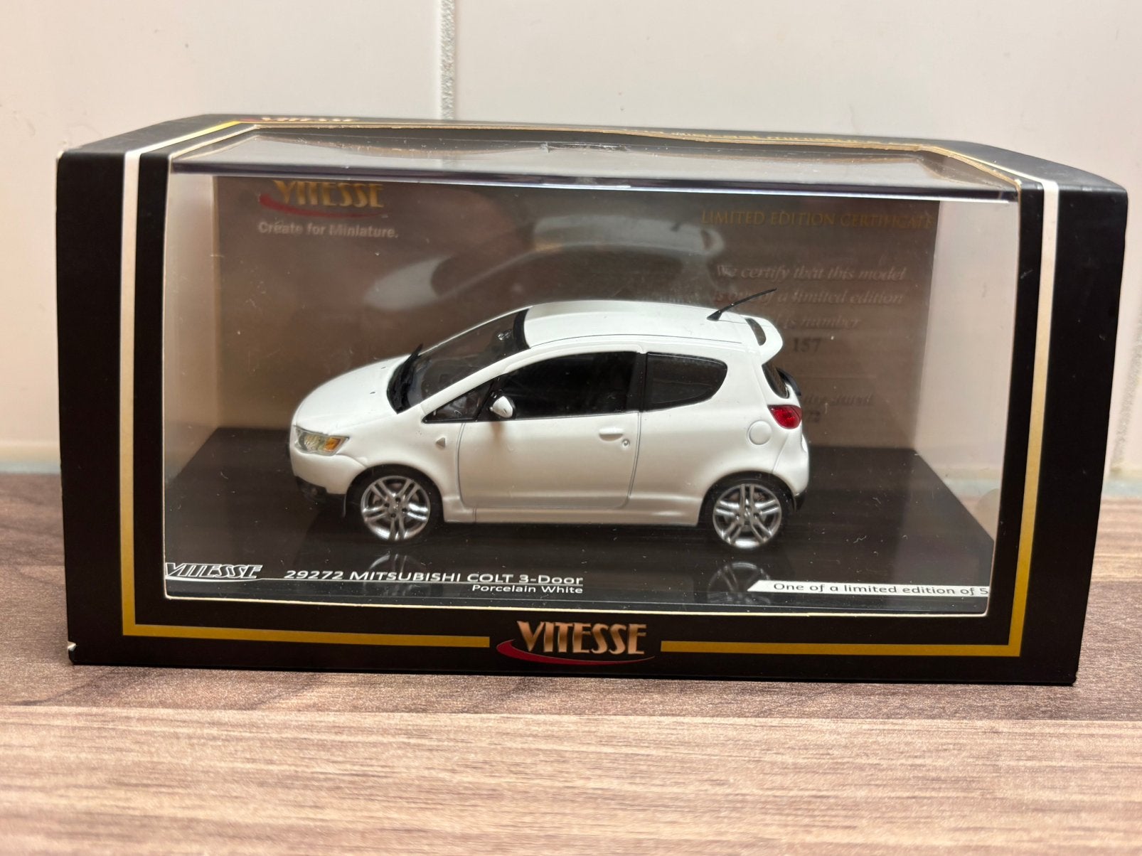 Mitsubishi Colt 2009 Porcelain White Vitesse 1:43, Ophalen of Verzenden, Nieuw, Auto, Overige merken