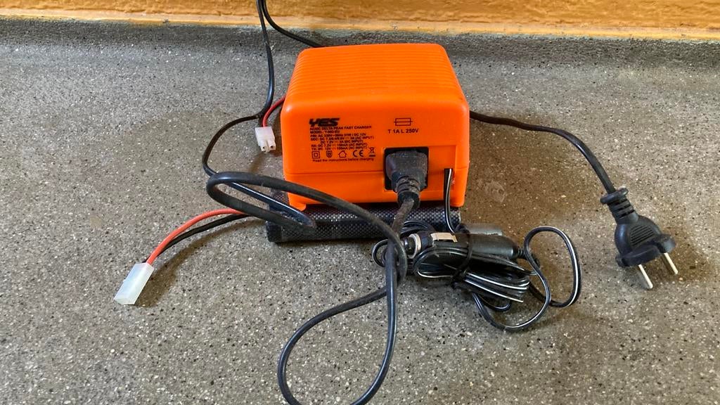 NICAD Lader modelracen rc auto boot + gratis accupack, Ophalen of Verzenden, Gebruikt