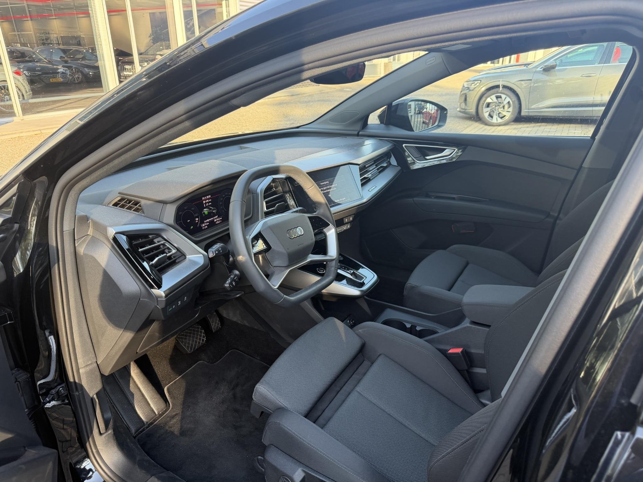 Audi Q4 Sportback e-tron 45 quattro Advanced edition 82 kWh, Automaat, 12 maanden, Stof, Verwarmde buitenspiegels