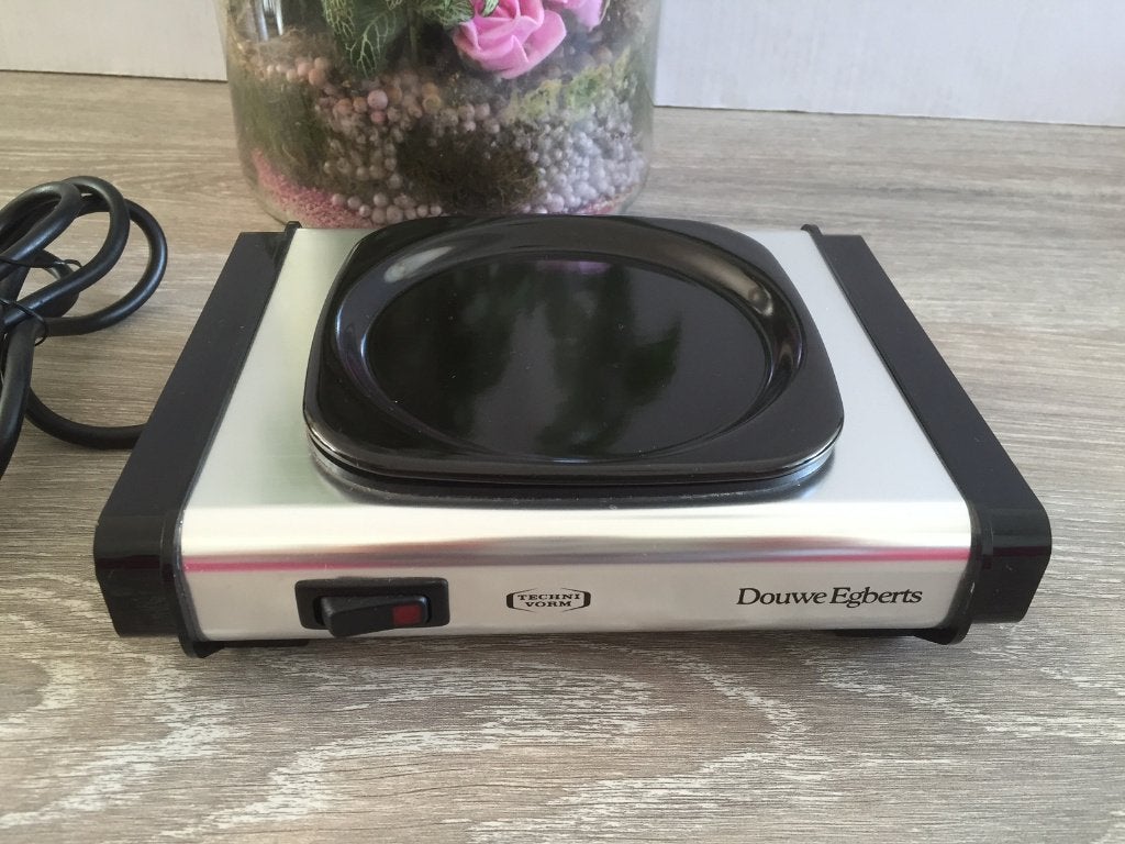 Z.G.A.N. elek warmhoudplaatje van Douwe Egberts warmhouder, Overige typen, Ophalen of Verzenden, Zo goed als nieuw, Metaal