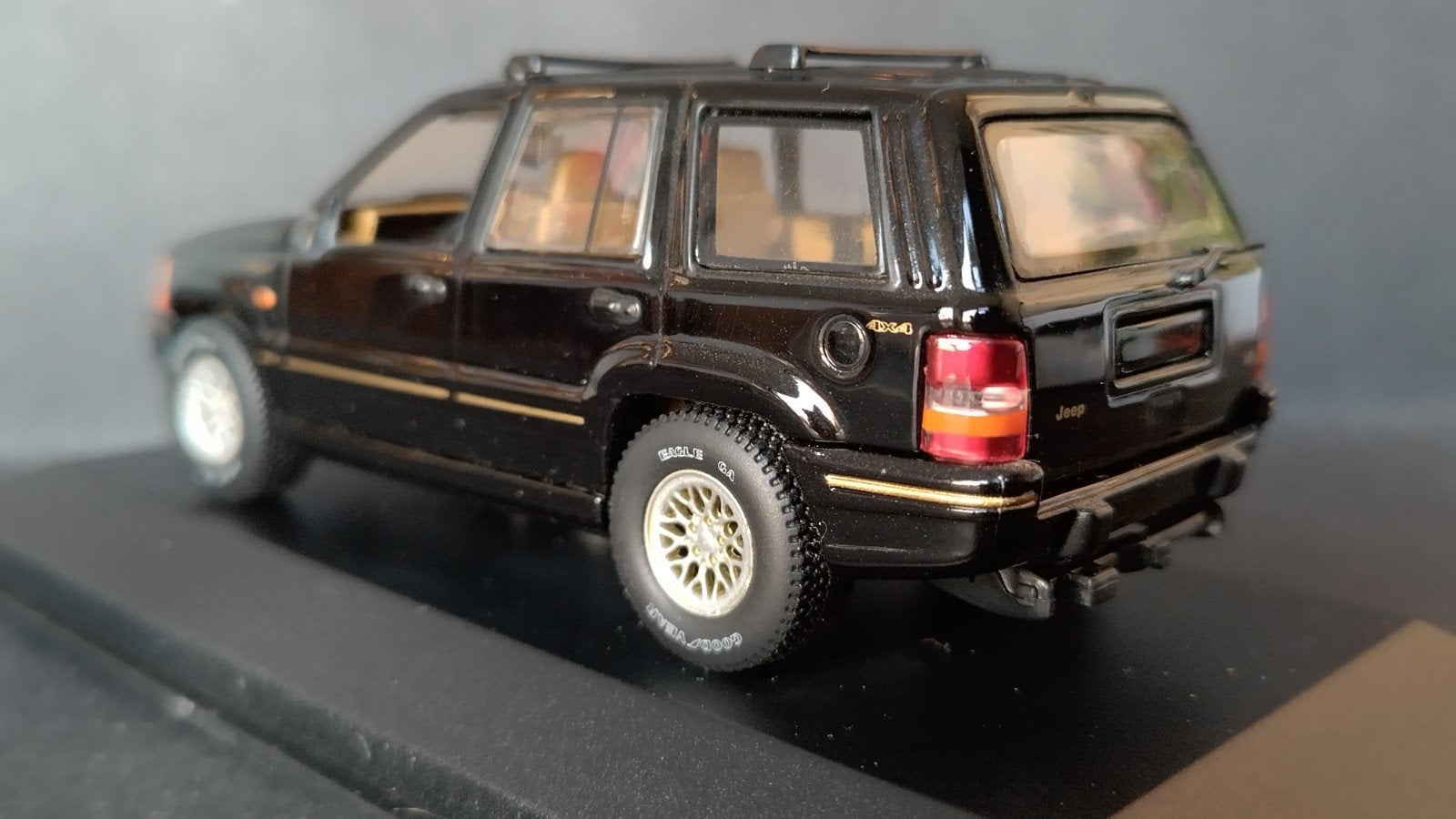 Jeep Grand Cherokee 1:43 Minichamps Pol, Hobby en Vrije tijd, Modelauto's | 1:43, Auto, Verzenden, ., Zo goed als nieuw