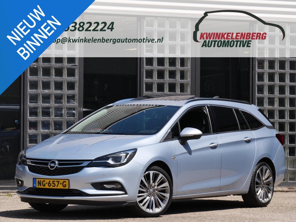Opel Astra ST 1.4T INNOVATION/ SCHUIFDAK/ TREKHAAK/ BLIS/ CA, Auto's, Parkeersensor, Stof, Gebruikt, 4 cilinders